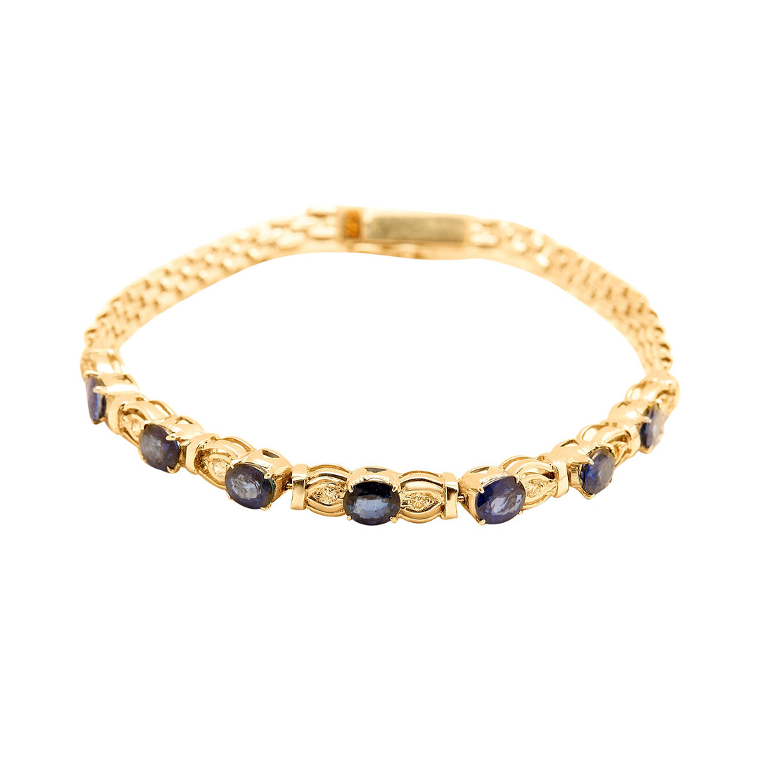 GOLD BRACELET WITH BLUE SAPPHIRE STONES